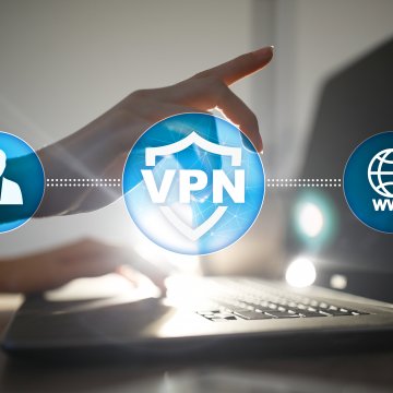 hand typing laptop vpn internet vpn services ivpn